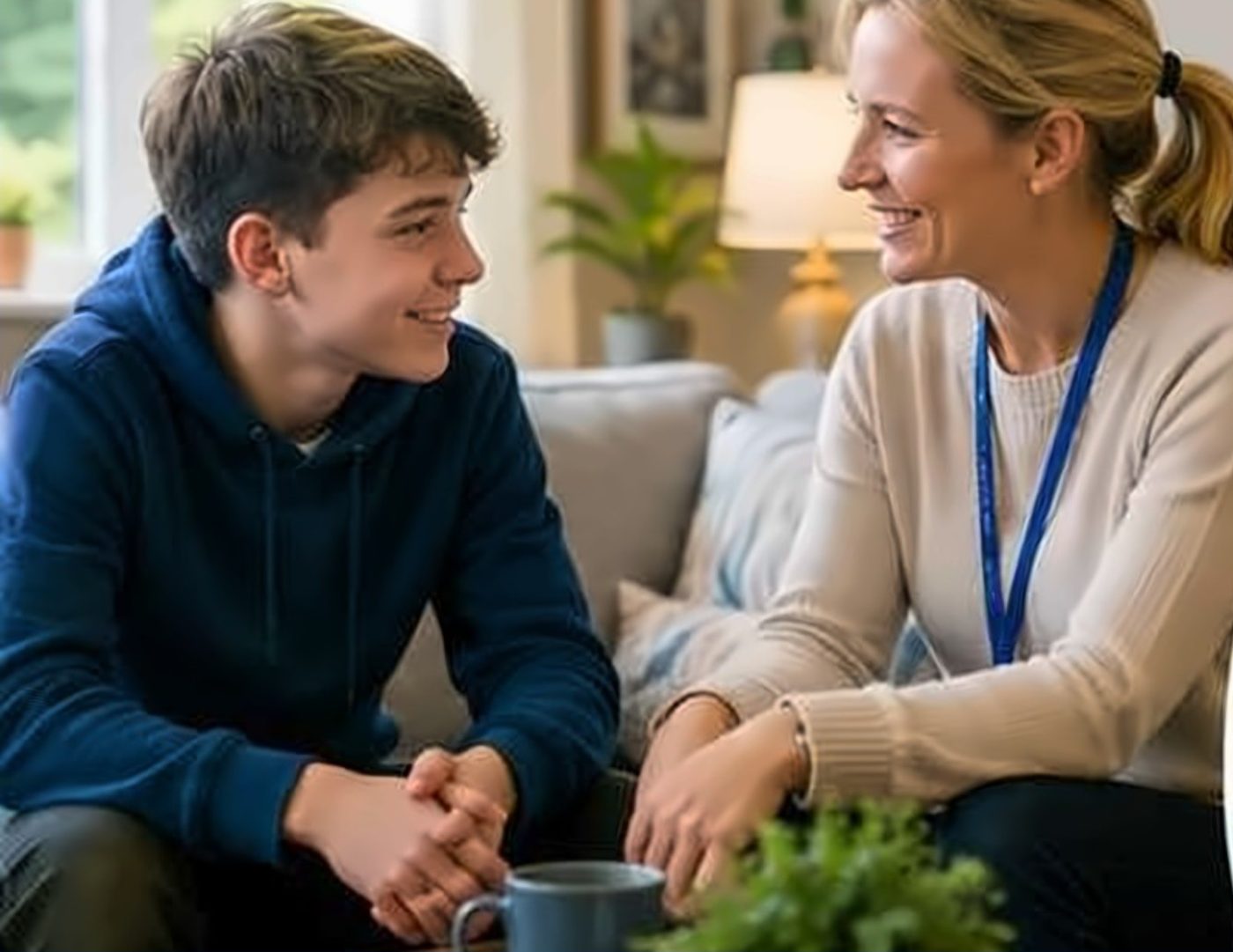 A young person talking with a support worker