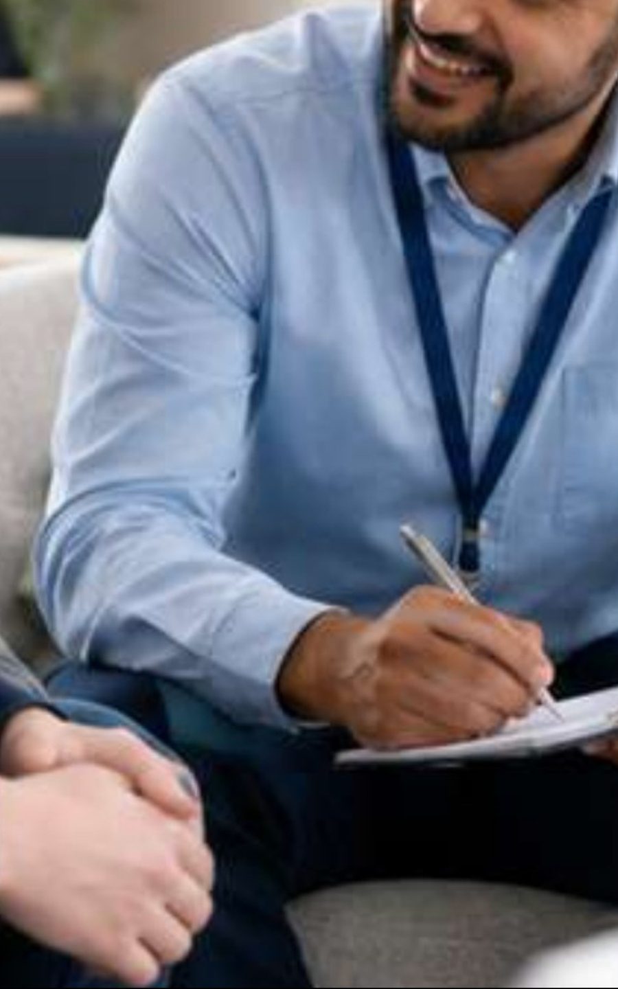 A member of the referrals team in a meeting
